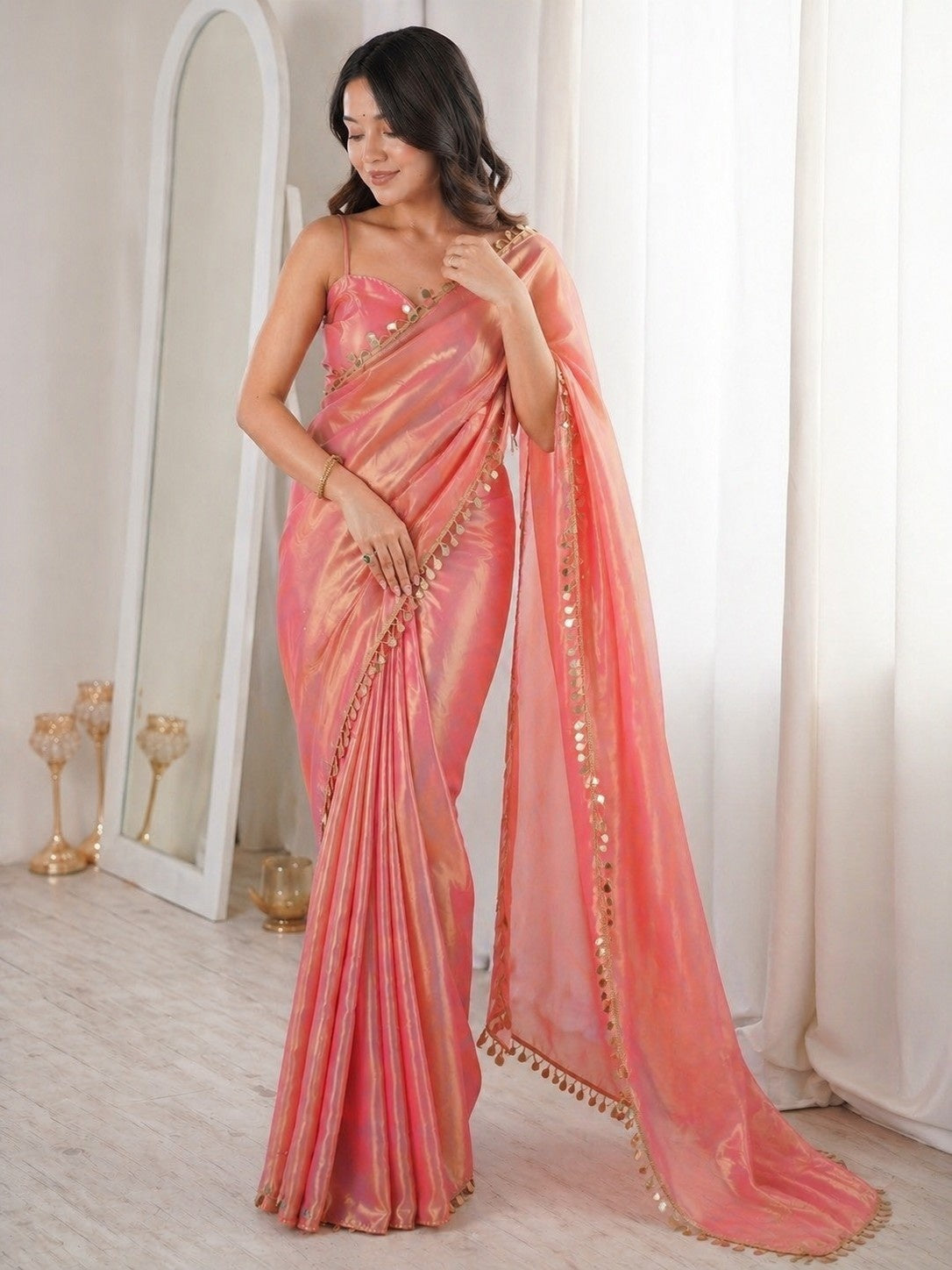 Blush Pink Shimmer Saree with Golden Tassel Border