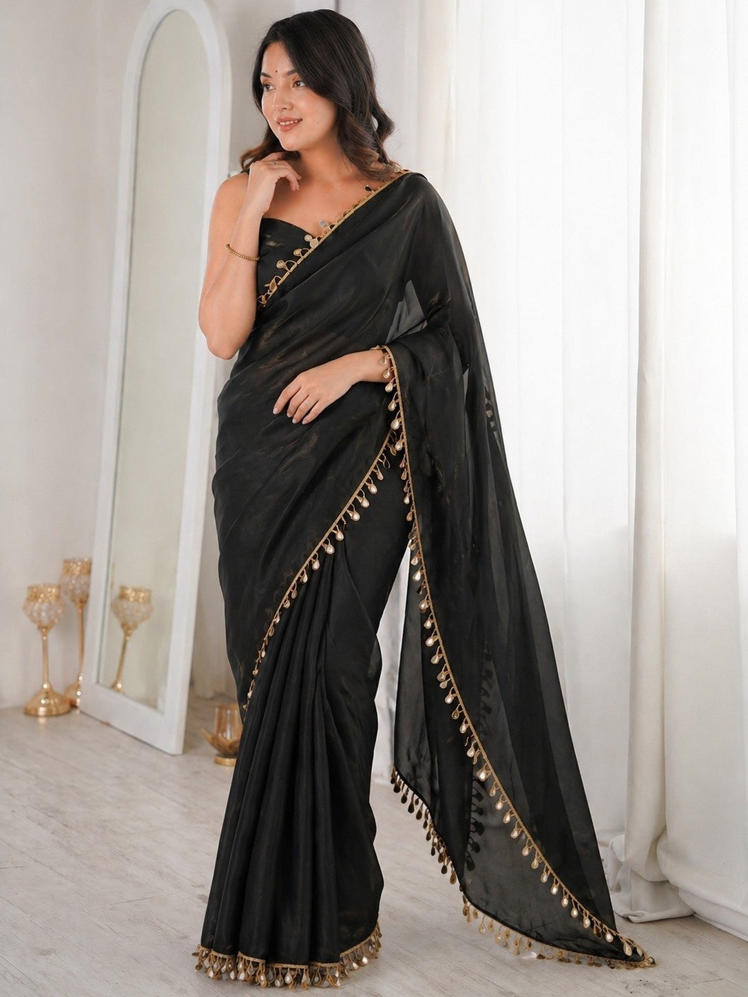 Midnight Black Organza Saree with Elegant Golden Lace Border