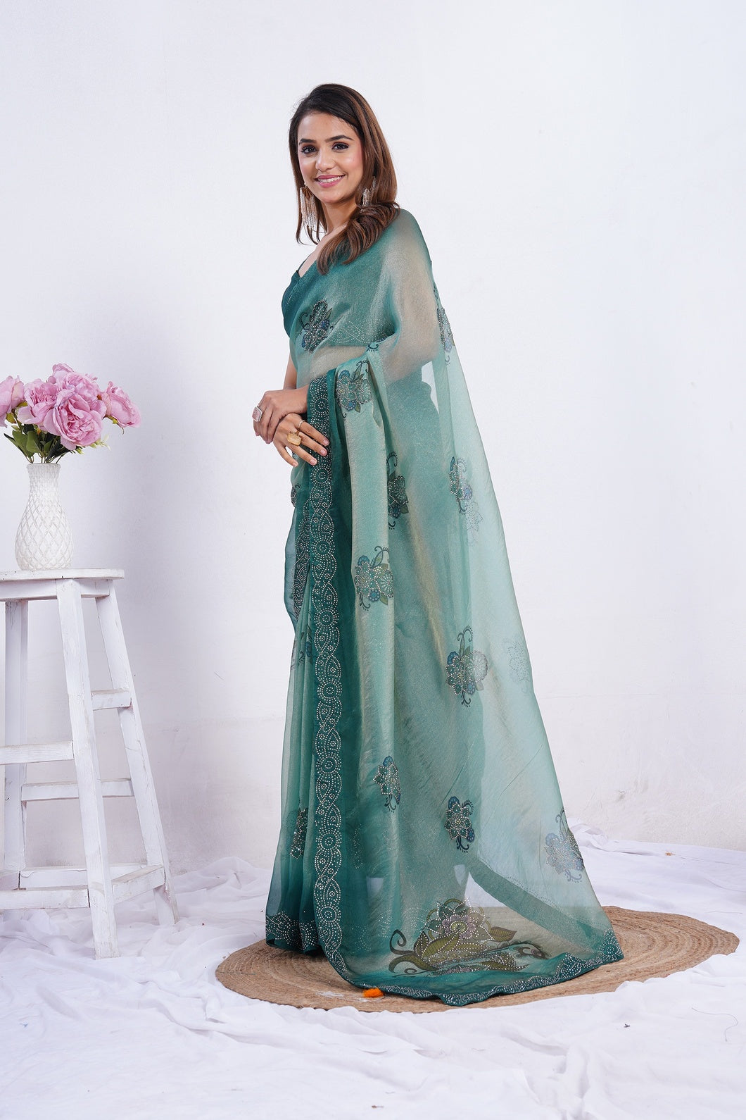 Sea Green Embroidered Organza Saree with Designer Border & Unstitched Blouse Piece