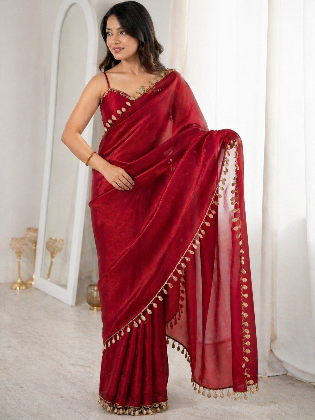 Ruby Red Organza Saree with Golden Tassel Border & Designer Blouse